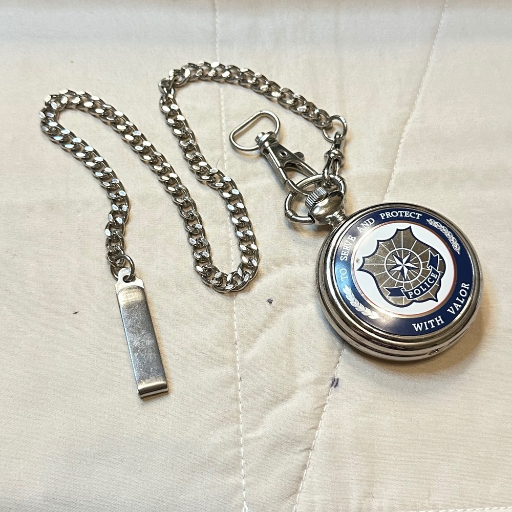 Silver Tone Pocket Watch w/Chain. Police Emblem on Front.